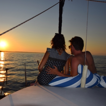V.I.P Sunset Sailing Tour Chalkidiki - couple watching sunset on sailboat